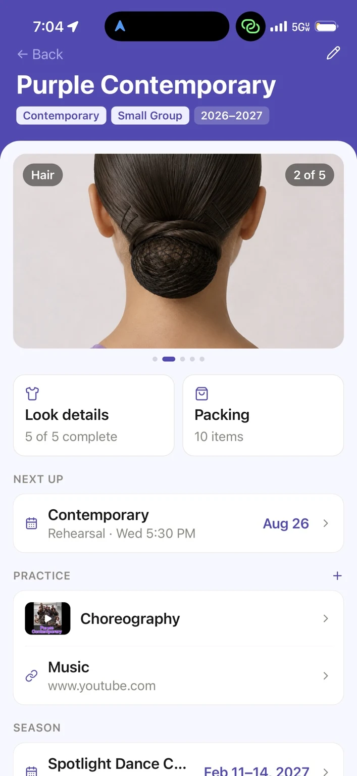 Ovation Purple Contemporary routine showing a sleek center-part low bun hair reference.